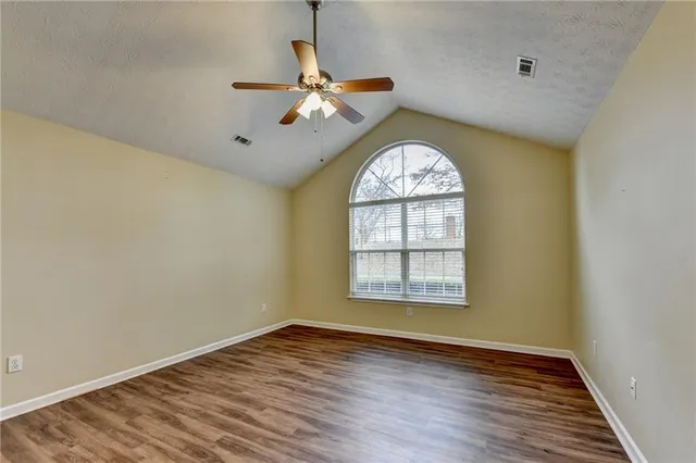 an empty room with windows