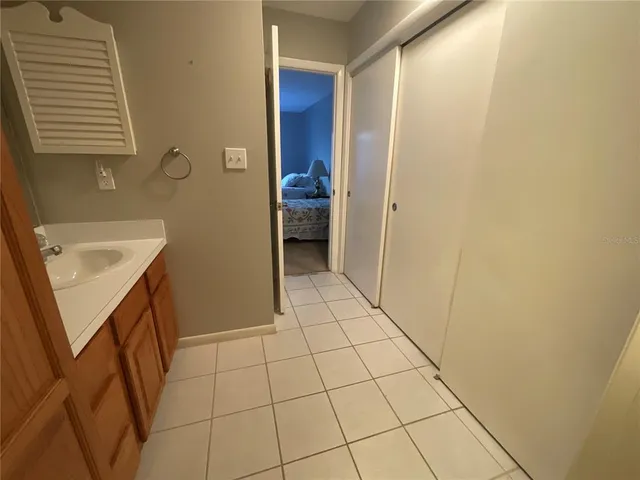 a bedroom with a bed and furniture