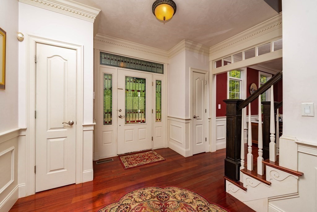 63 Bridge Street Raynham, MA 02767 - Photo 26 of 38 a view of an entryway with wooden floor