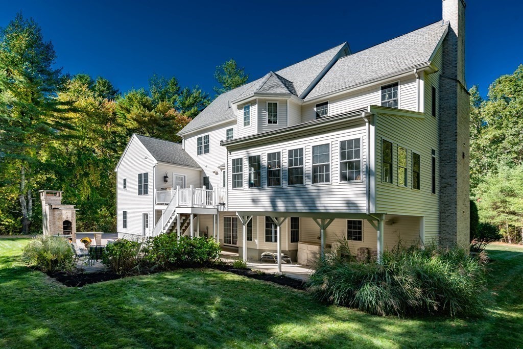 63 Bridge Street Raynham, MA 02767 - Photo 3 of 38 a house view with a garden space