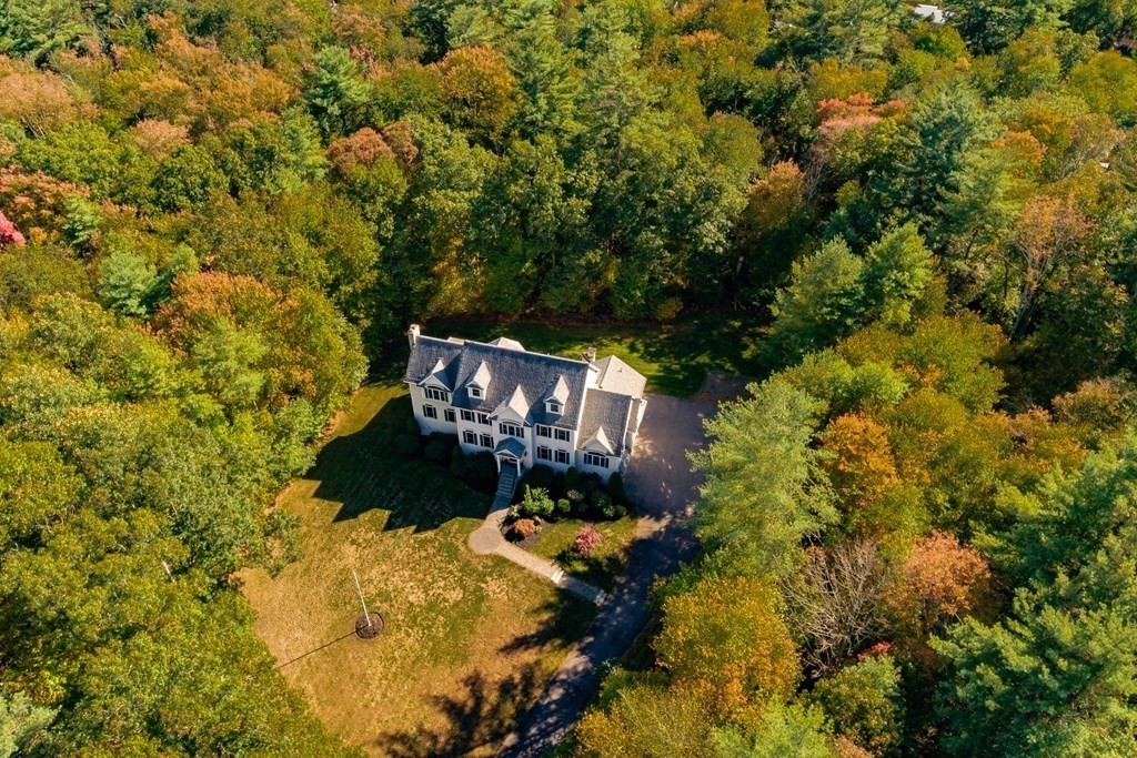 63 Bridge Street Raynham, MA 02767 - Photo 7 of 38 a view of a house with a yard