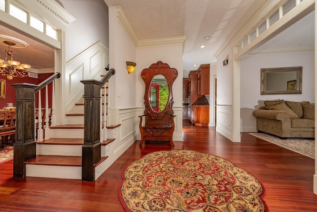 63 Bridge Street Raynham, MA 02767 - Photo 8 of 38 a living room with furniture and wooden floor