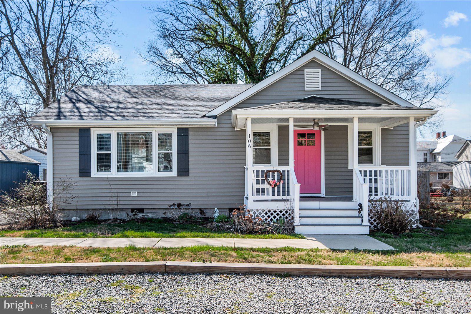 106 Jefferson Street Colonial Beach, VA 22443 - Photo 1 of 1 Charming home with a vibrant entrance.