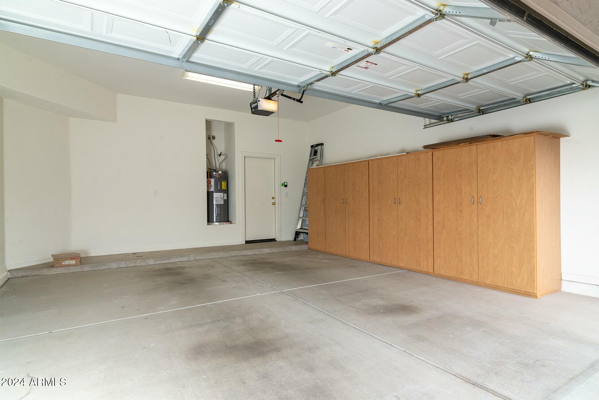 10169 East Dinosaur Ridge Road Gold Canyon, AZ 85118 - Photo 40 of 43 Garage with wall of cabinets