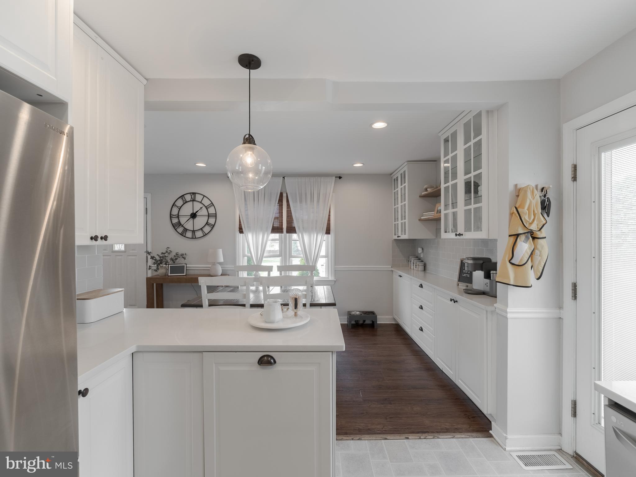 239 Hamel Avenue Glenside, PA 19038 - Photo 16 of 38 a kitchen with refrigerator and window