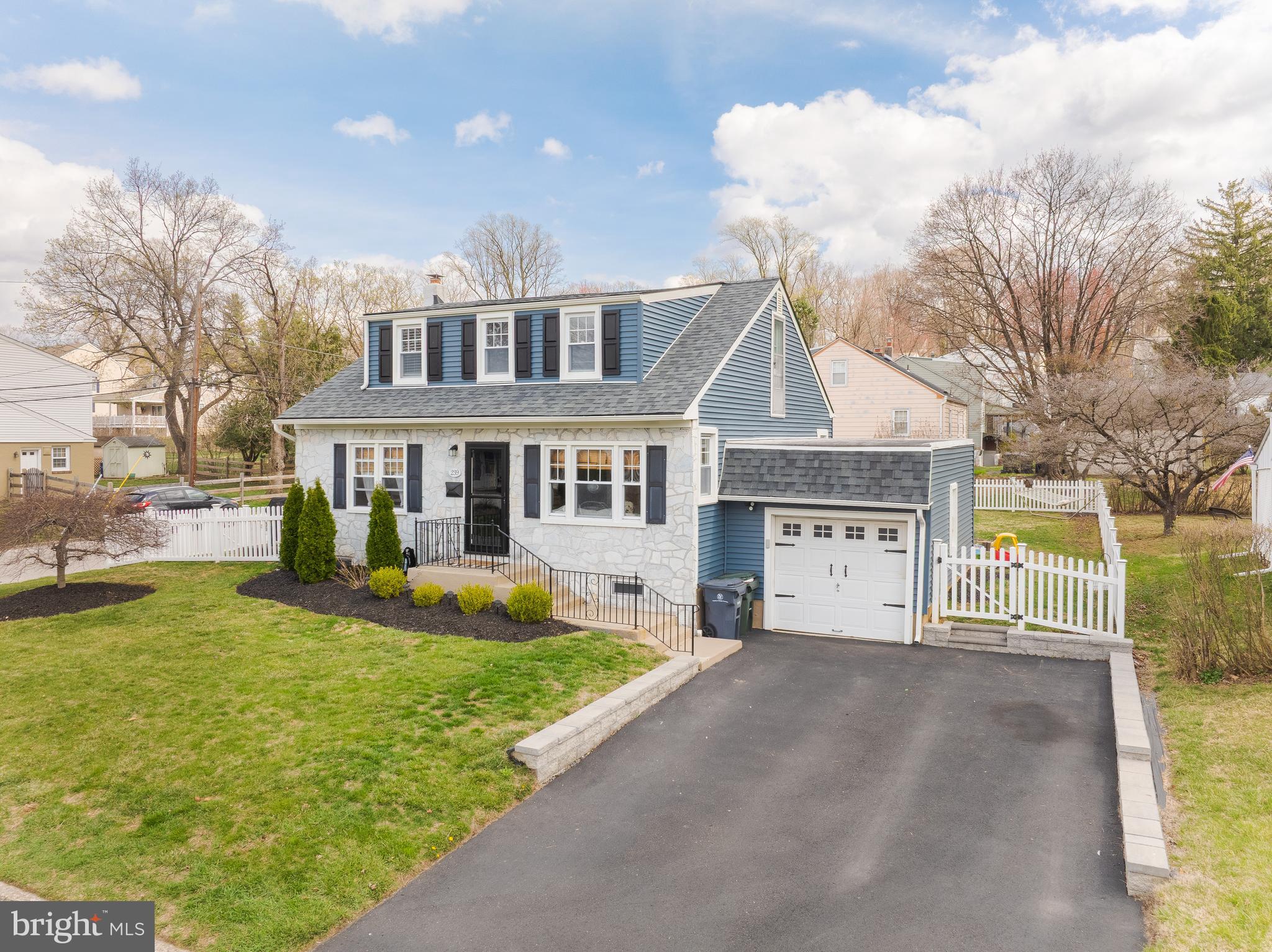 239 Hamel Avenue Glenside, PA 19038 - Photo 2 of 38 a front view of a house with a yard garage and outdoor seating