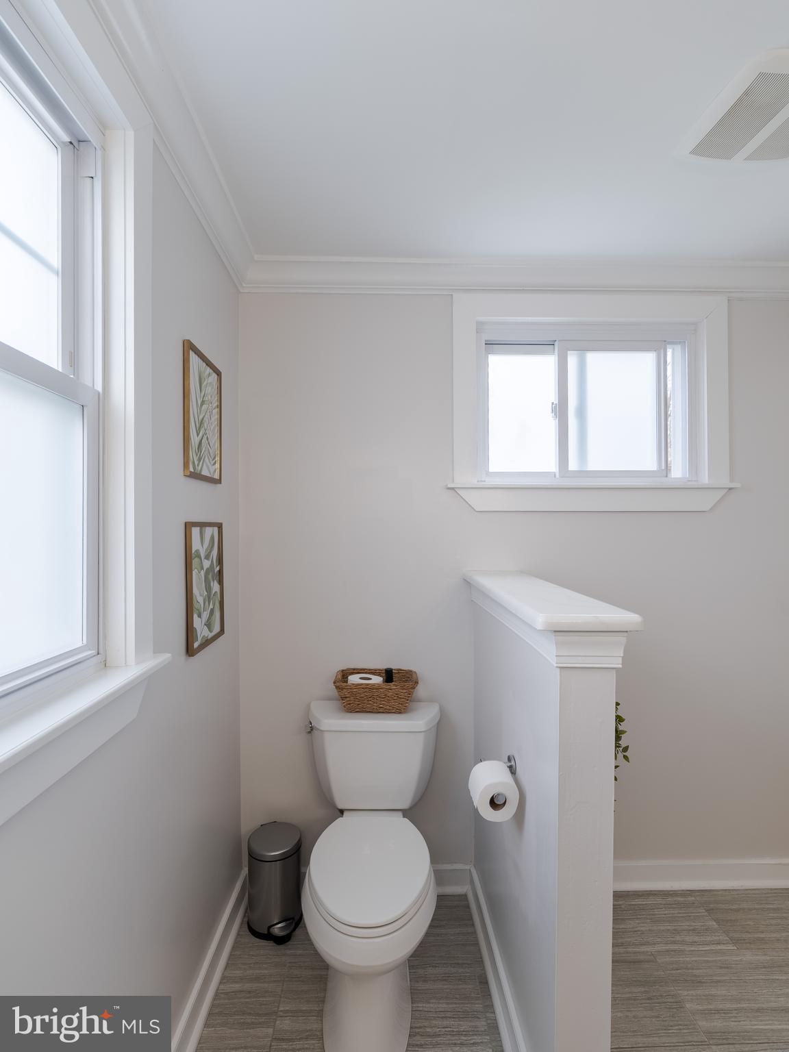 239 Hamel Avenue Glenside, PA 19038 - Photo 26 of 38 a white toilet sitting next to a bathroom sink
