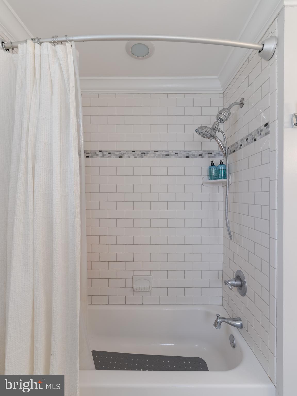 239 Hamel Avenue Glenside, PA 19038 - Photo 27 of 38 a bathroom with a shower and a bathtub