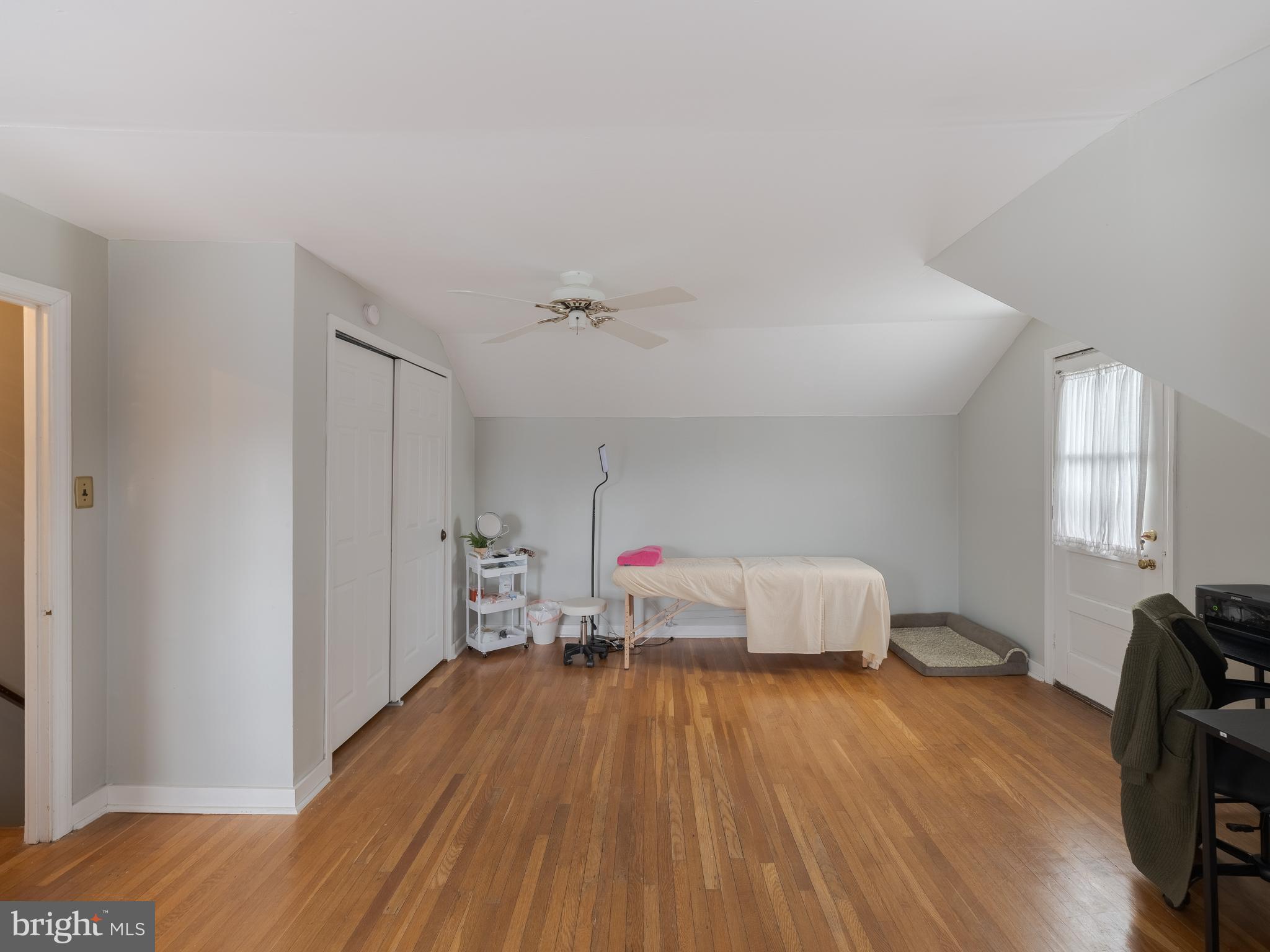 239 Hamel Avenue Glenside, PA 19038 - Photo 29 of 38 a bedroom with a bed and wooden floor