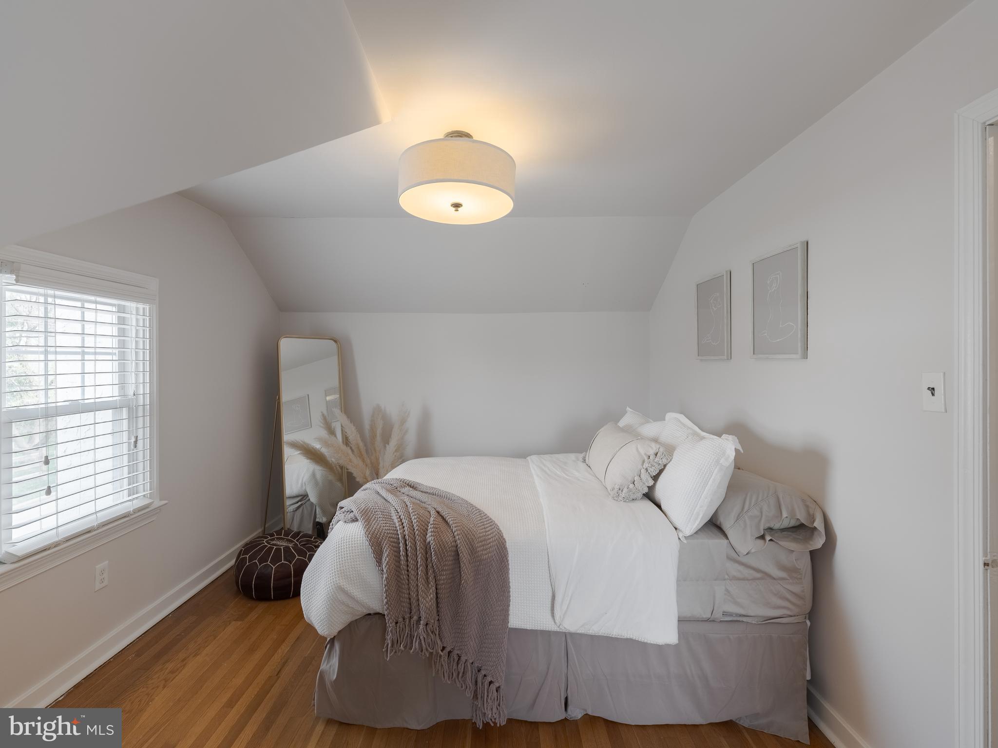 239 Hamel Avenue Glenside, PA 19038 - Photo 31 of 38 a bedroom with a bed and a window