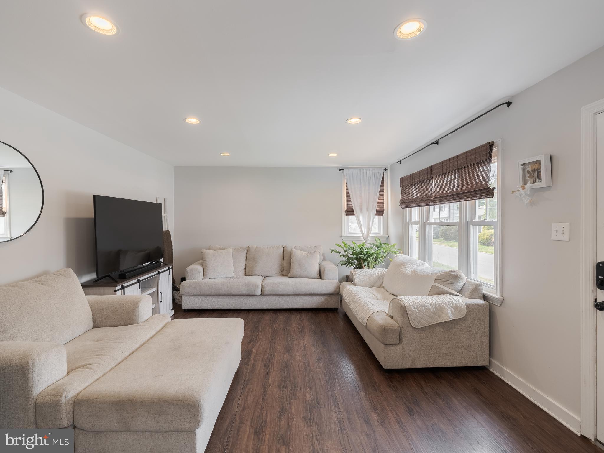 239 Hamel Avenue Glenside, PA 19038 - Photo 9 of 38 a living room with furniture and a flat screen tv