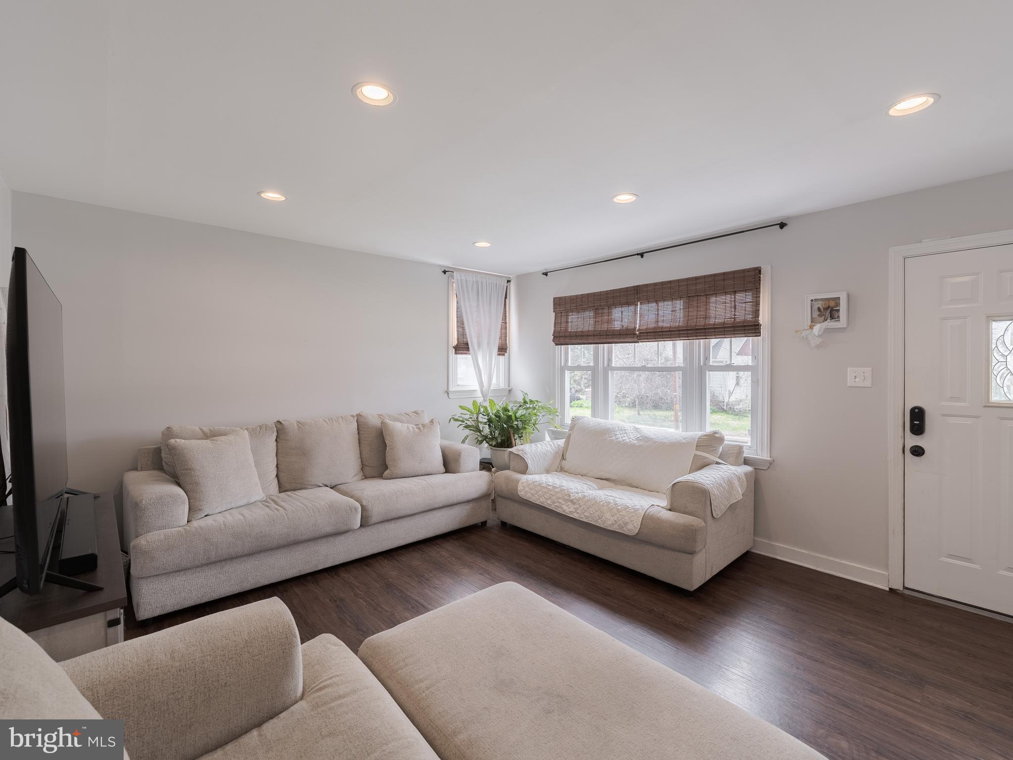 239 Hamel Avenue Glenside, PA 19038 - Photo 10 of 38 a living room with furniture and a large window