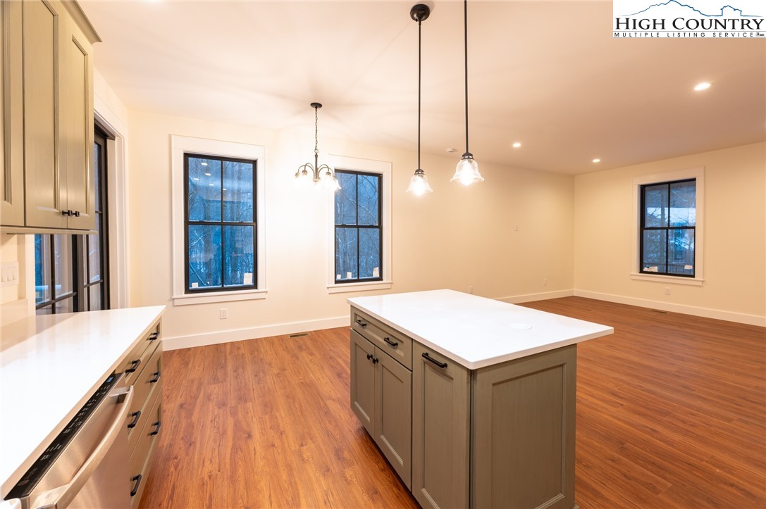 131 Bryce Way Boone, NC 28607 - Photo 12 of 38 a kitchen with a sink and wooden floor