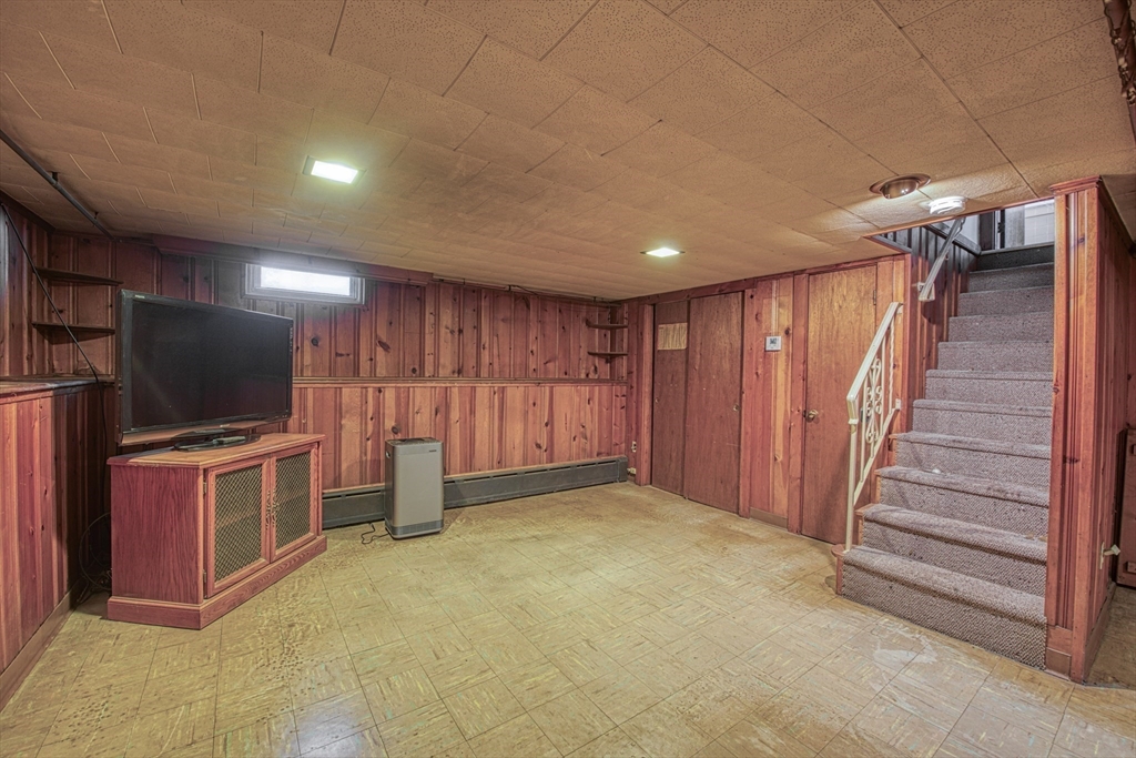 197 Turnpike Street Canton, MA 02021 - Photo 14 of 17 a view of a livingroom with entryway furniture and windows