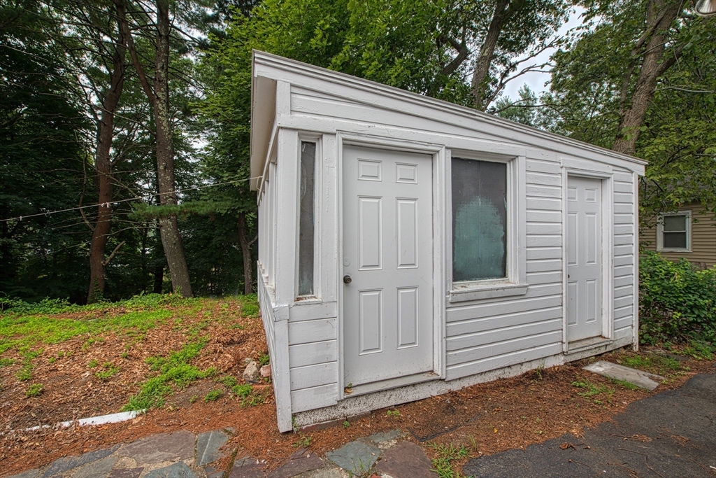 197 Turnpike Street Canton, MA 02021 - Photo 15 of 17 a view of a small house with yard