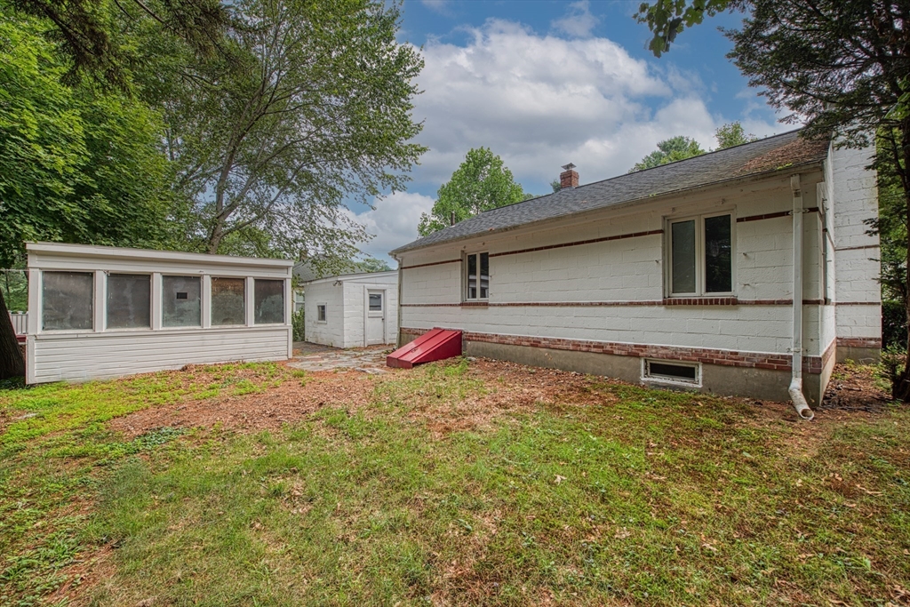 197 Turnpike Street Canton, MA 02021 - Photo 17 of 17 a backyard of a house with table and chairs