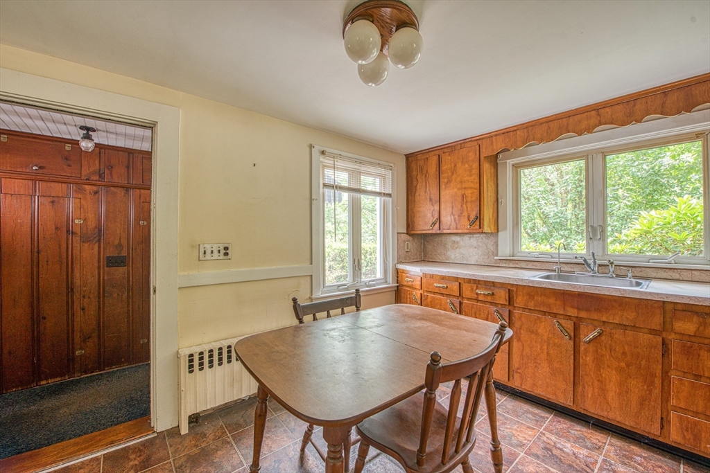 197 Turnpike Street Canton, MA 02021 - Photo 6 of 17 a kitchen with a table and chairs in it