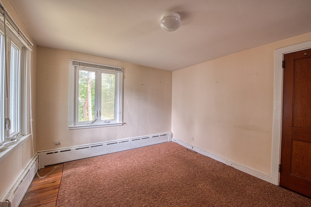 197 Turnpike Street Canton, MA 02021 - Photo 9 of 17 an empty room with a window