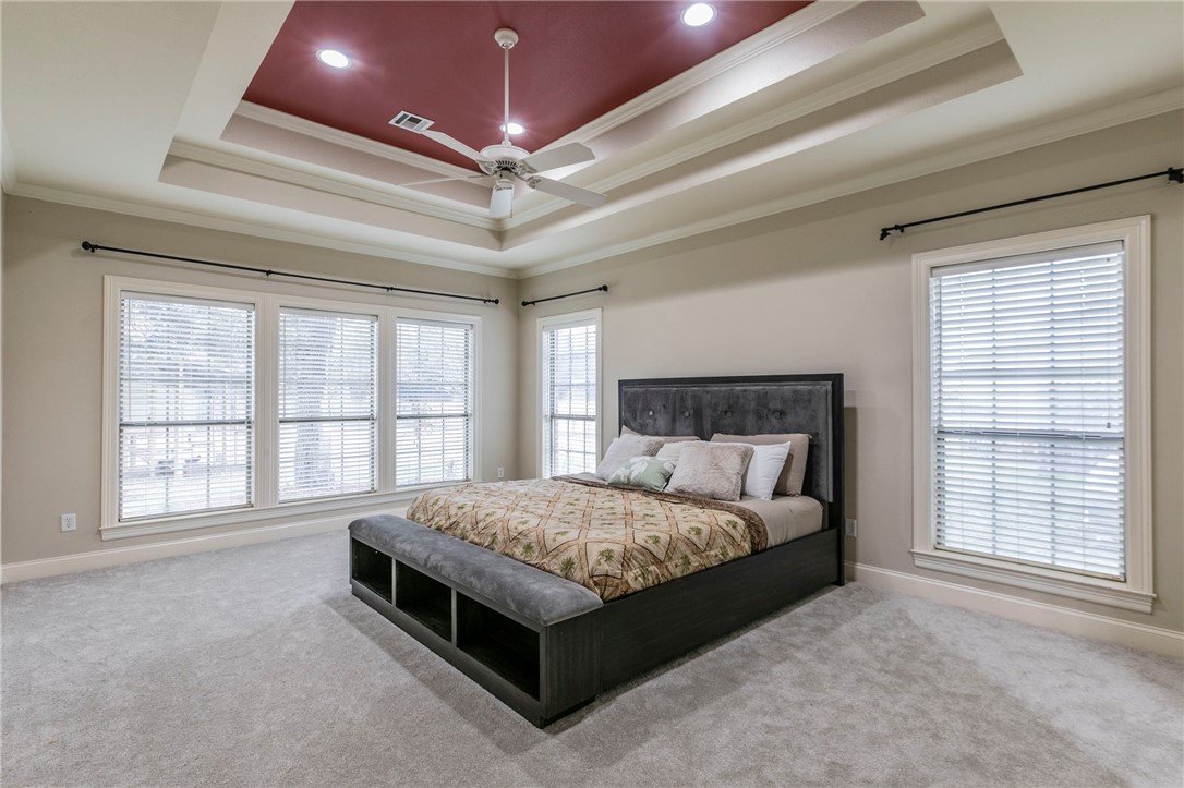 1031 Briar Glen Circle McGregor, TX 76657 - Photo 19 of 41 a spacious bedroom with a bed and window