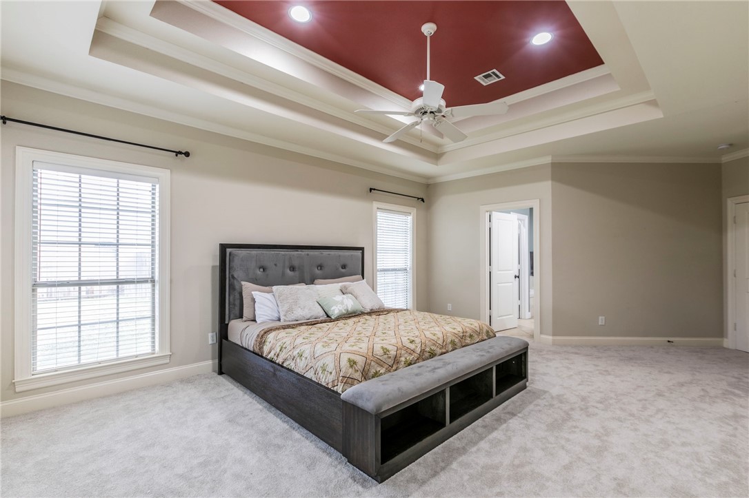 1031 Briar Glen Circle McGregor, TX 76657 - Photo 20 of 41 a bed room with a bed and a ceiling fan