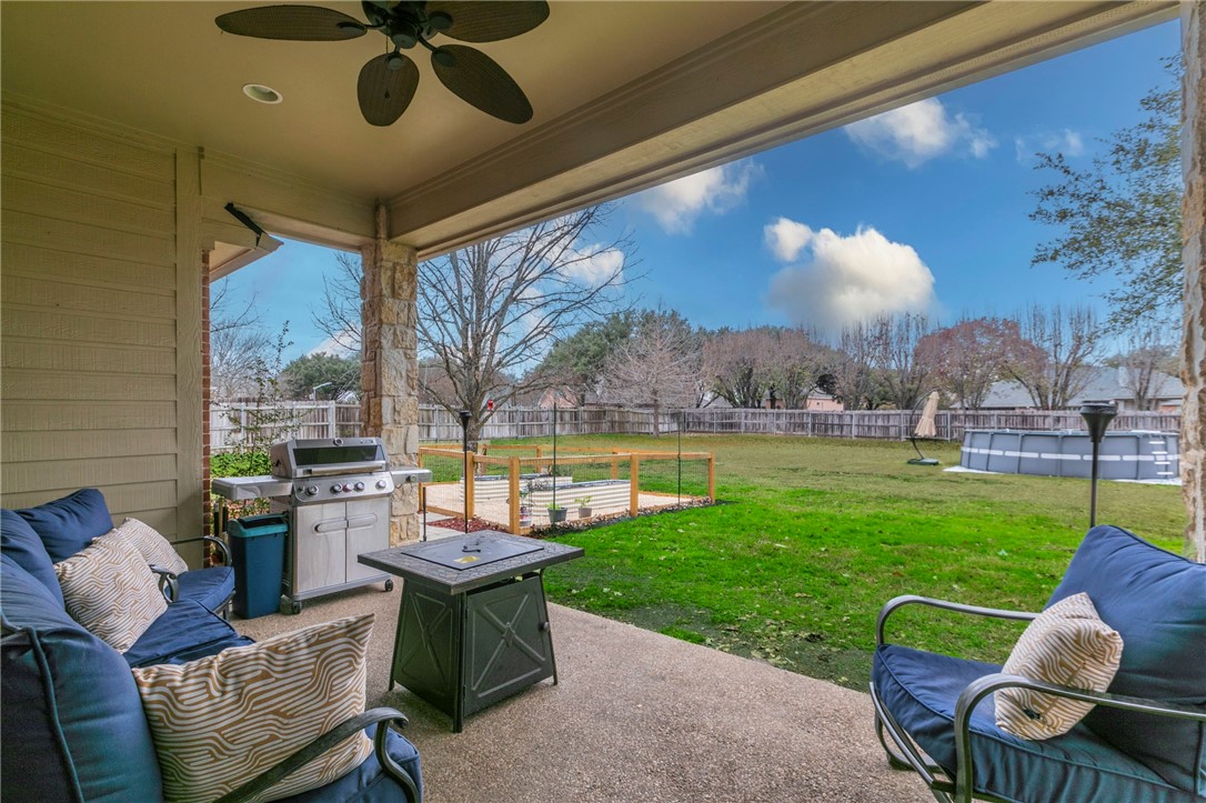 1031 Briar Glen Circle McGregor, TX 76657 - Photo 36 of 41 a patio with yard table and chairs