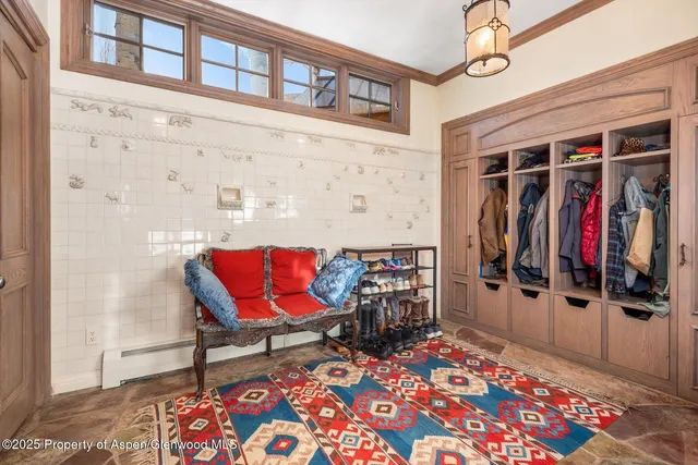 a view of a house with swimming pool and sitting area