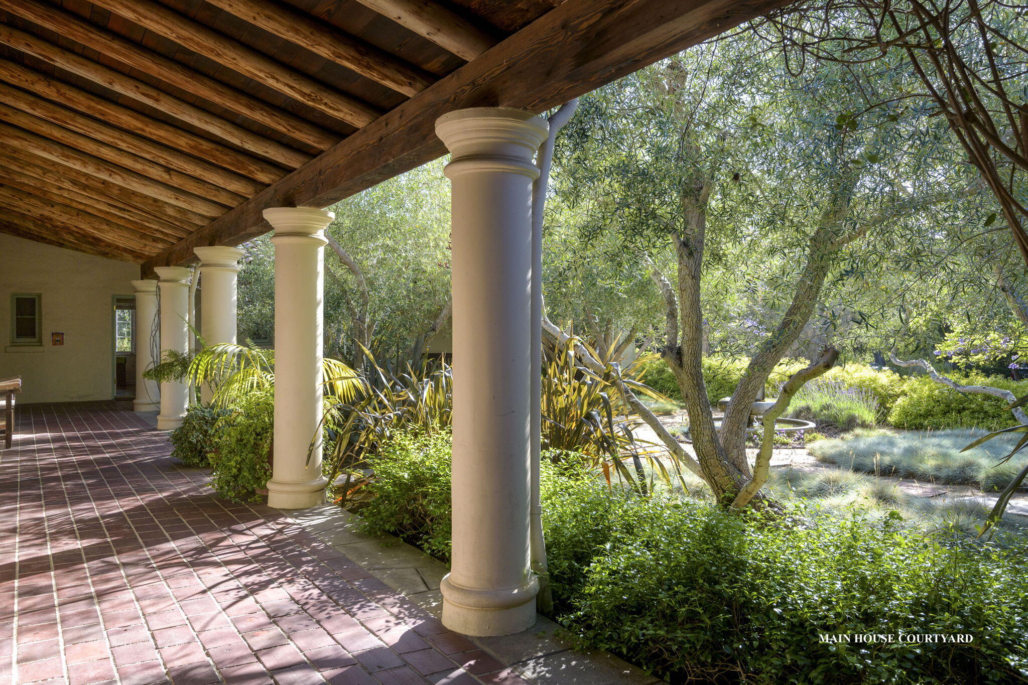 249 Lambert Road Carpinteria, CA 93013 - Photo 17 of 51 a view of a porch with garden