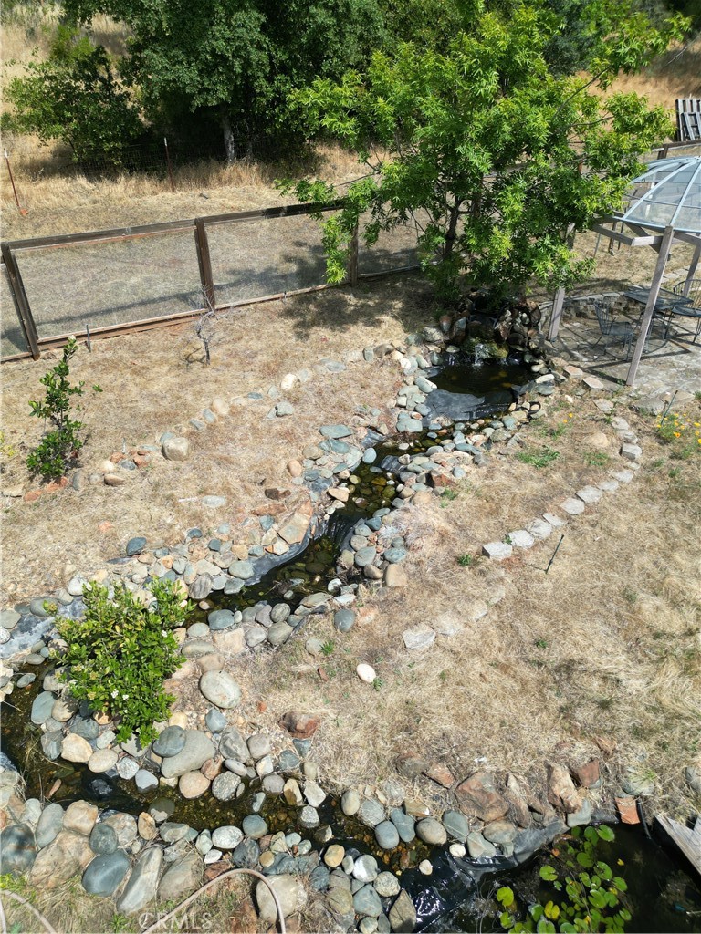 185 Grimont Road Oroville, CA 95966 - Photo 3 of 43 a view of a yard with a trees
