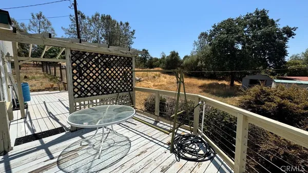 a patio with table and chairs