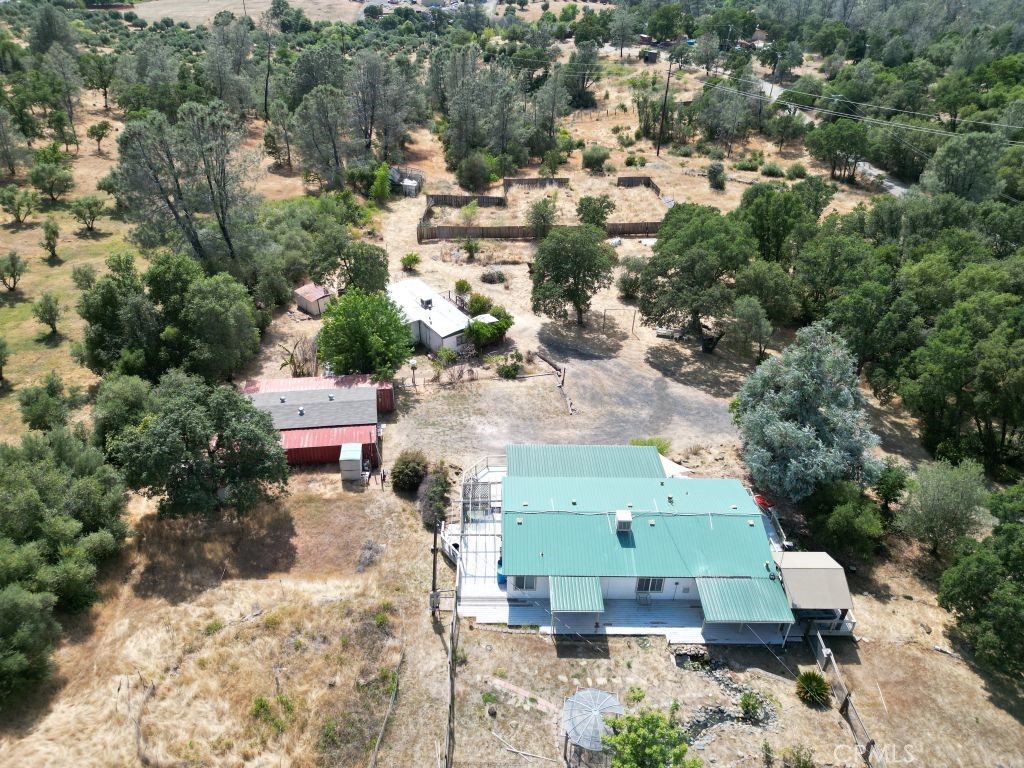 185 Grimont Road Oroville, CA 95966 - Photo 4 of 43 an aerial view of a house with a yard swimming pool and outdoor seating