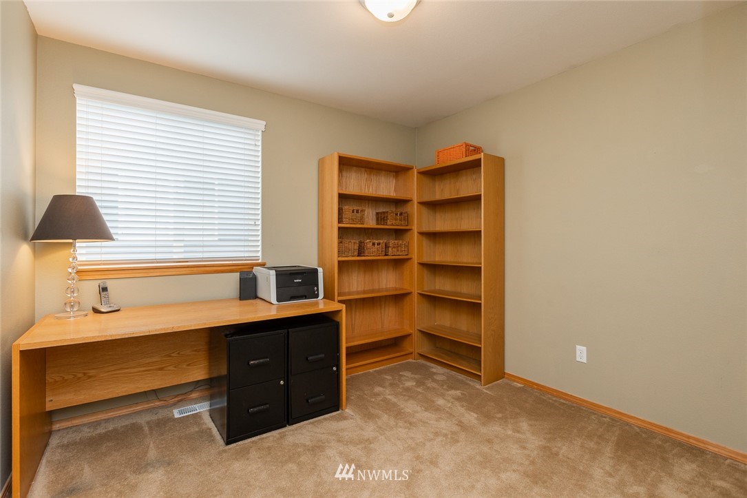 659 Shadow Avenue Northeast Renton, WA 98059 - Photo 24 of 37 a room with a desk and a window