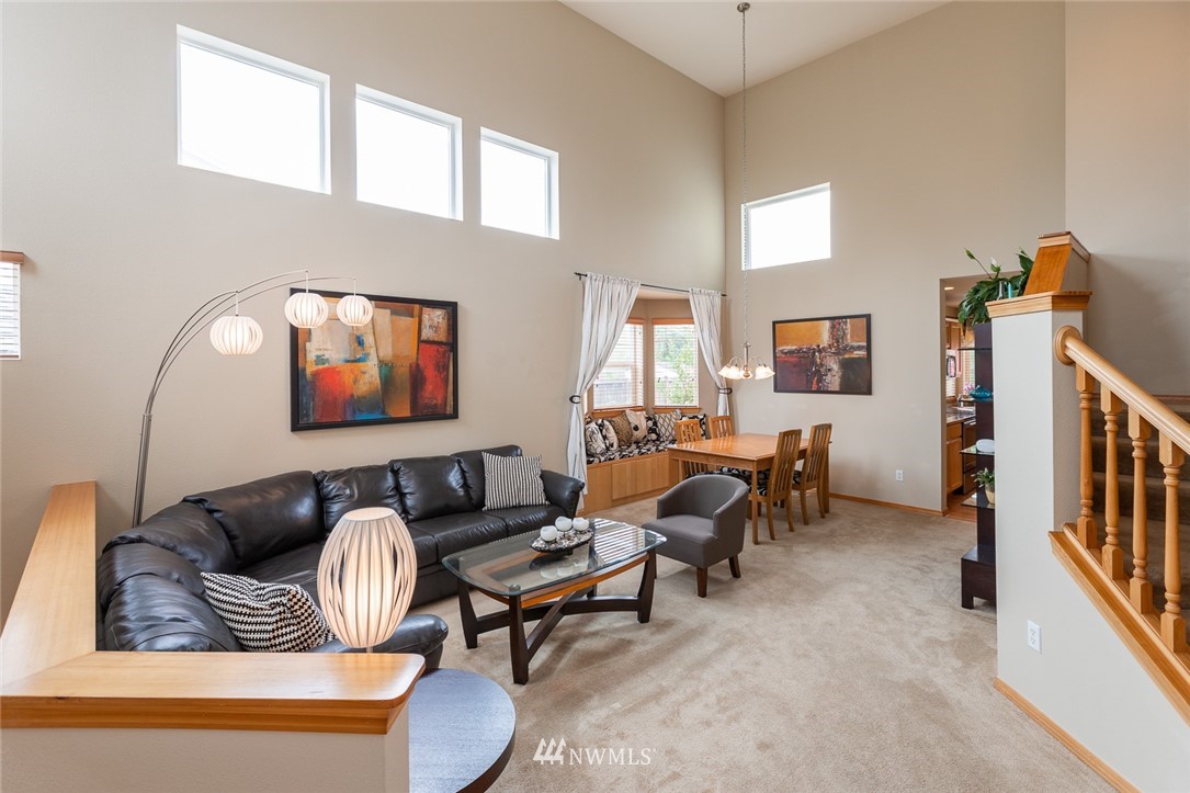 659 Shadow Avenue Northeast Renton, WA 98059 - Photo 5 of 37 a living room with furniture and a window