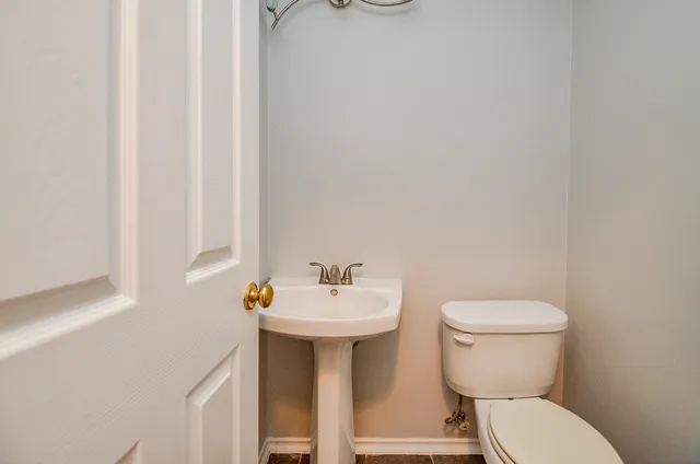 a bathroom with a sink and a toilet