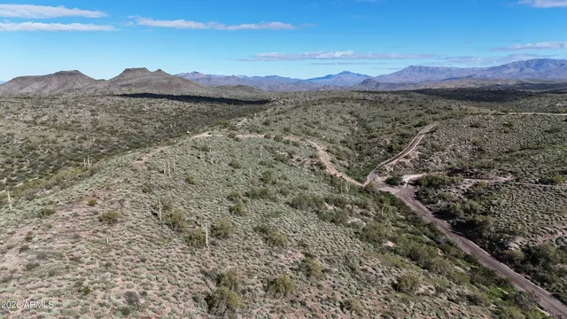 a view of a house with a mountain