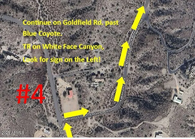 a aerial view of a house with a swimming pool