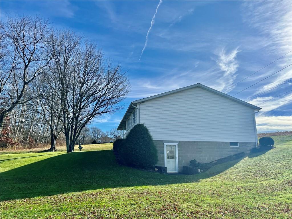 180 Dreher Road Butler, PA 16002 - Photo 24 of 25 a view of a house with a yard
