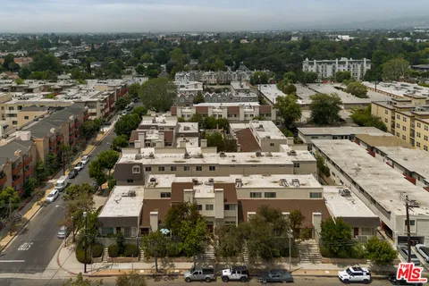 an aerial view of a city with lots of residential buildings