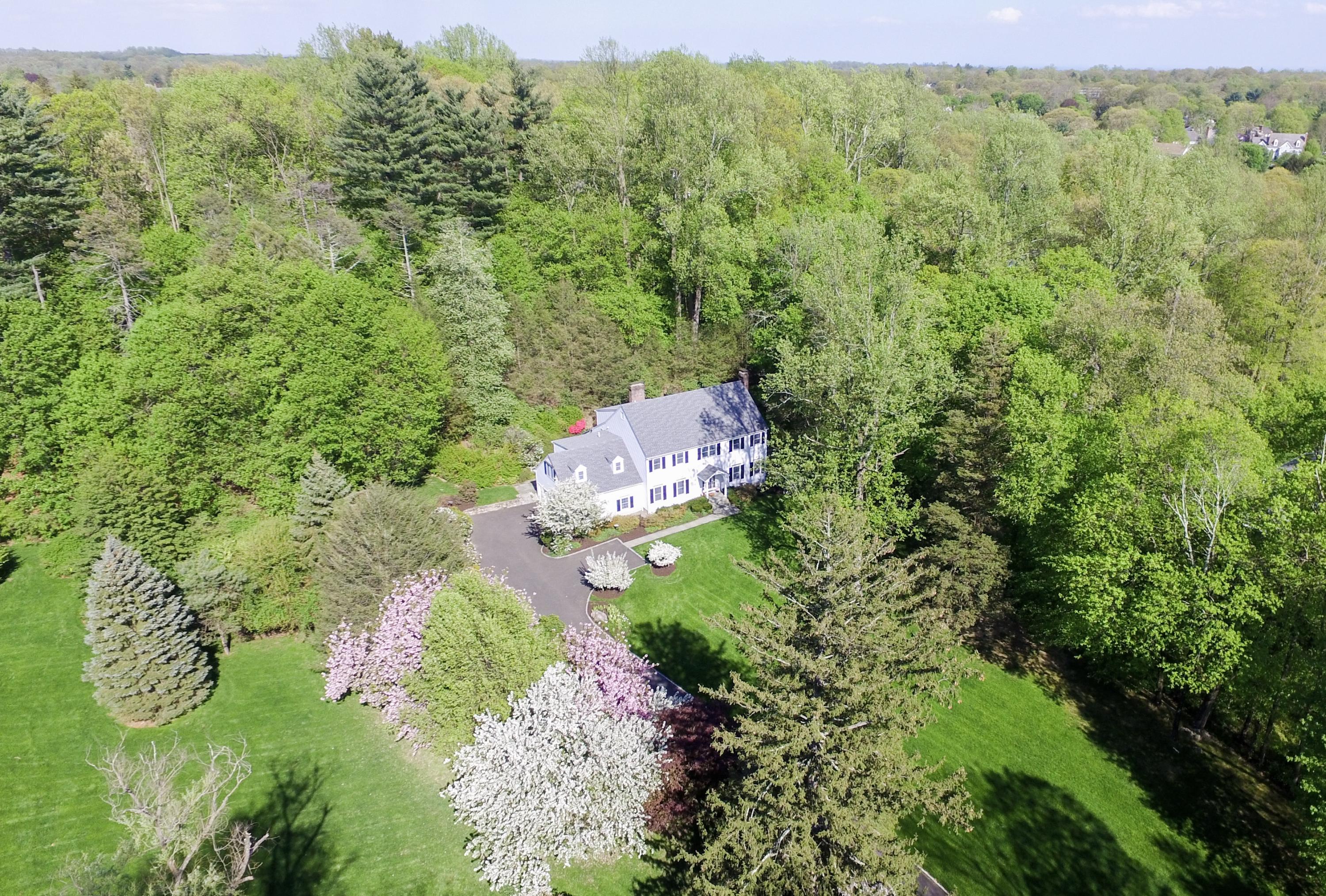 222 Marshall Ridge Road New Canaan, CT 06840 - Photo 1 of 49 a aerial view of a house with a yard