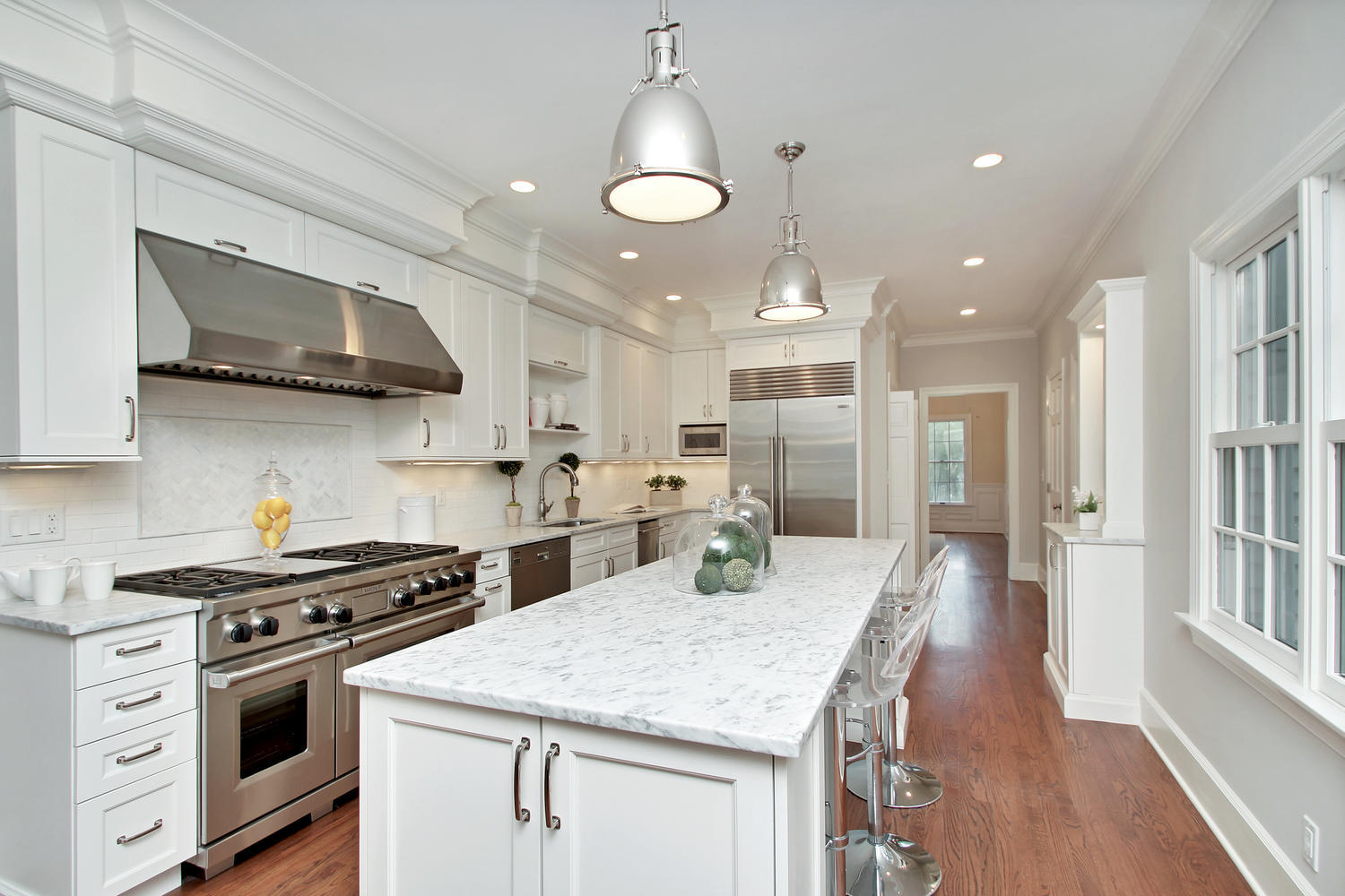 222 Marshall Ridge Road New Canaan, CT 06840 - Photo 13 of 49 a kitchen with stainless steel appliances granite countertop a stove and a wooden floors