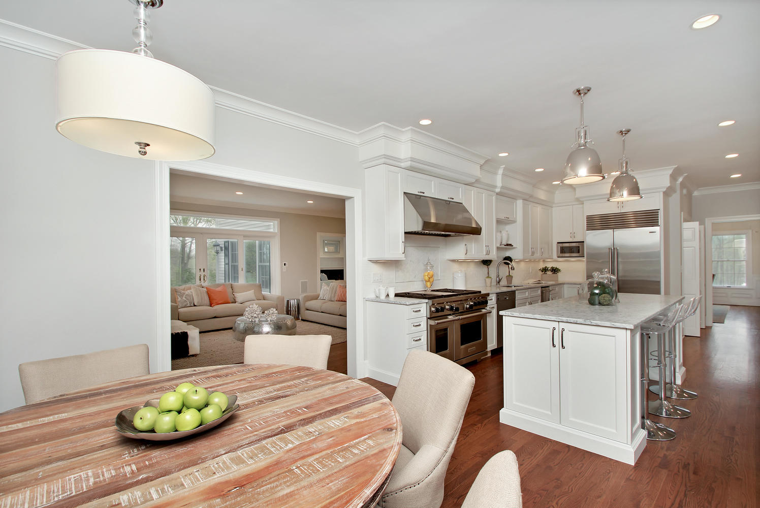 222 Marshall Ridge Road New Canaan, CT 06840 - Photo 14 of 49 a kitchen with kitchen island stainless steel appliances a dining table and chairs