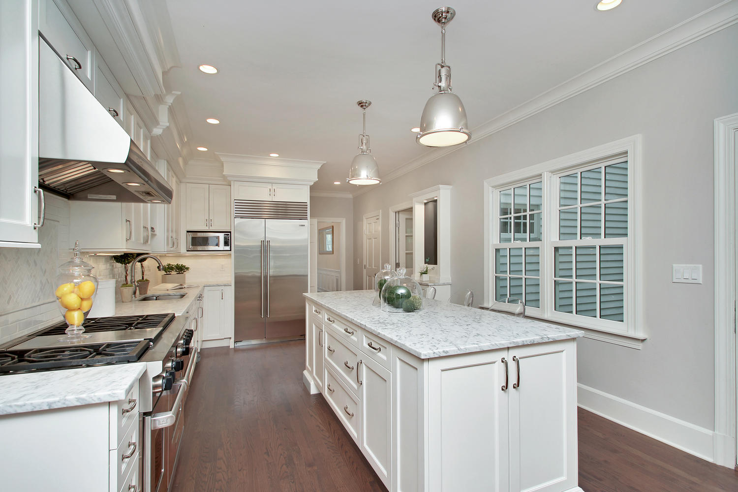 222 Marshall Ridge Road New Canaan, CT 06840 - Photo 15 of 49 a kitchen that has a lot of cabinets in it