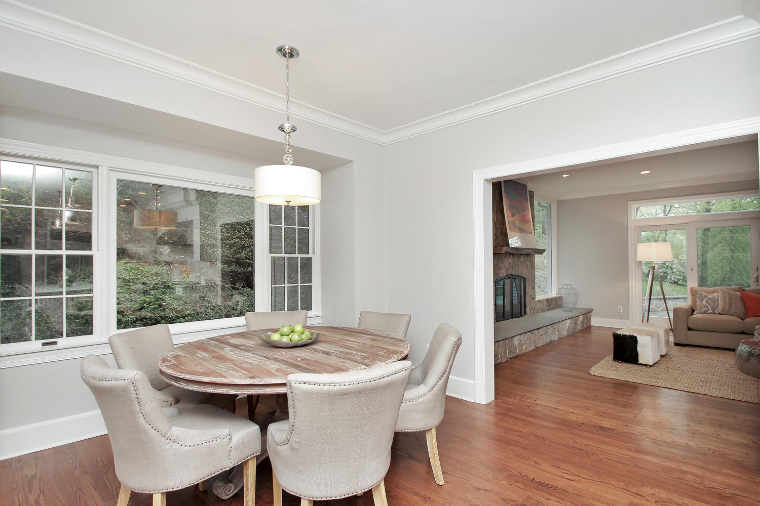 222 Marshall Ridge Road New Canaan, CT 06840 - Photo 17 of 49 a view of a dining room with furniture wooden floor and a chandelier