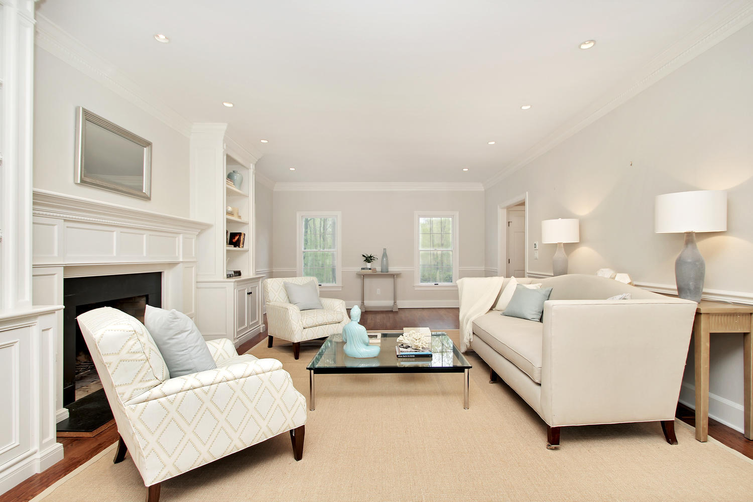 222 Marshall Ridge Road New Canaan, CT 06840 - Photo 19 of 49 a living room with furniture and a fireplace