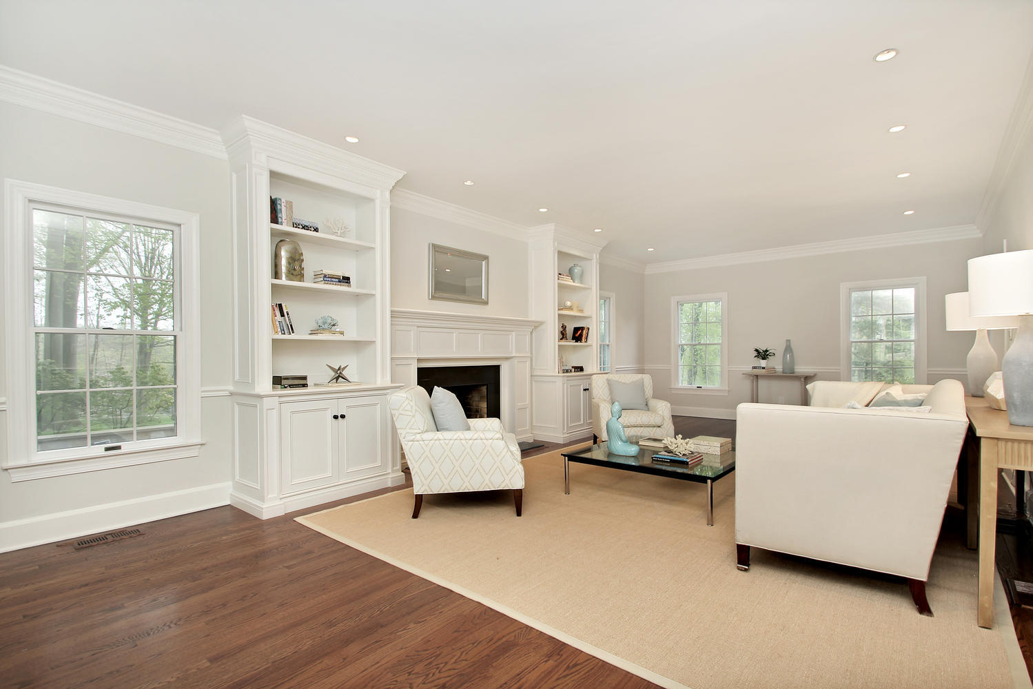 222 Marshall Ridge Road New Canaan, CT 06840 - Photo 22 of 49 a living room with furniture and a fireplace