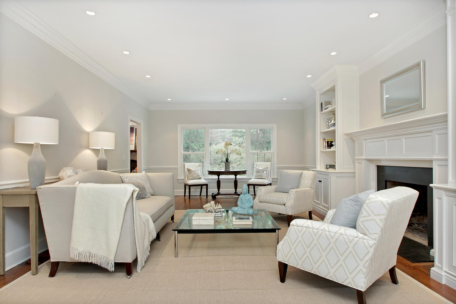 222 Marshall Ridge Road New Canaan, CT 06840 - Photo 23 of 49 a living room with furniture and a fireplace