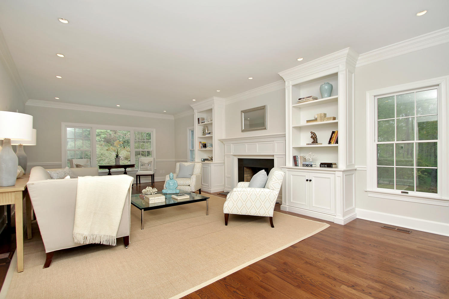 222 Marshall Ridge Road New Canaan, CT 06840 - Photo 24 of 49 a living room with furniture and a fireplace