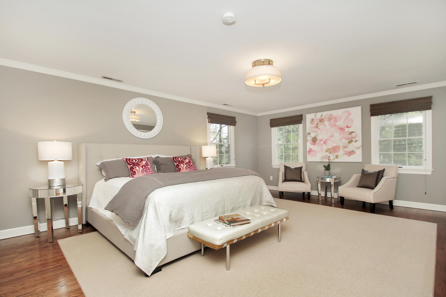 222 Marshall Ridge Road New Canaan, CT 06840 - Photo 27 of 49 a bedroom with a bed and wooden floor