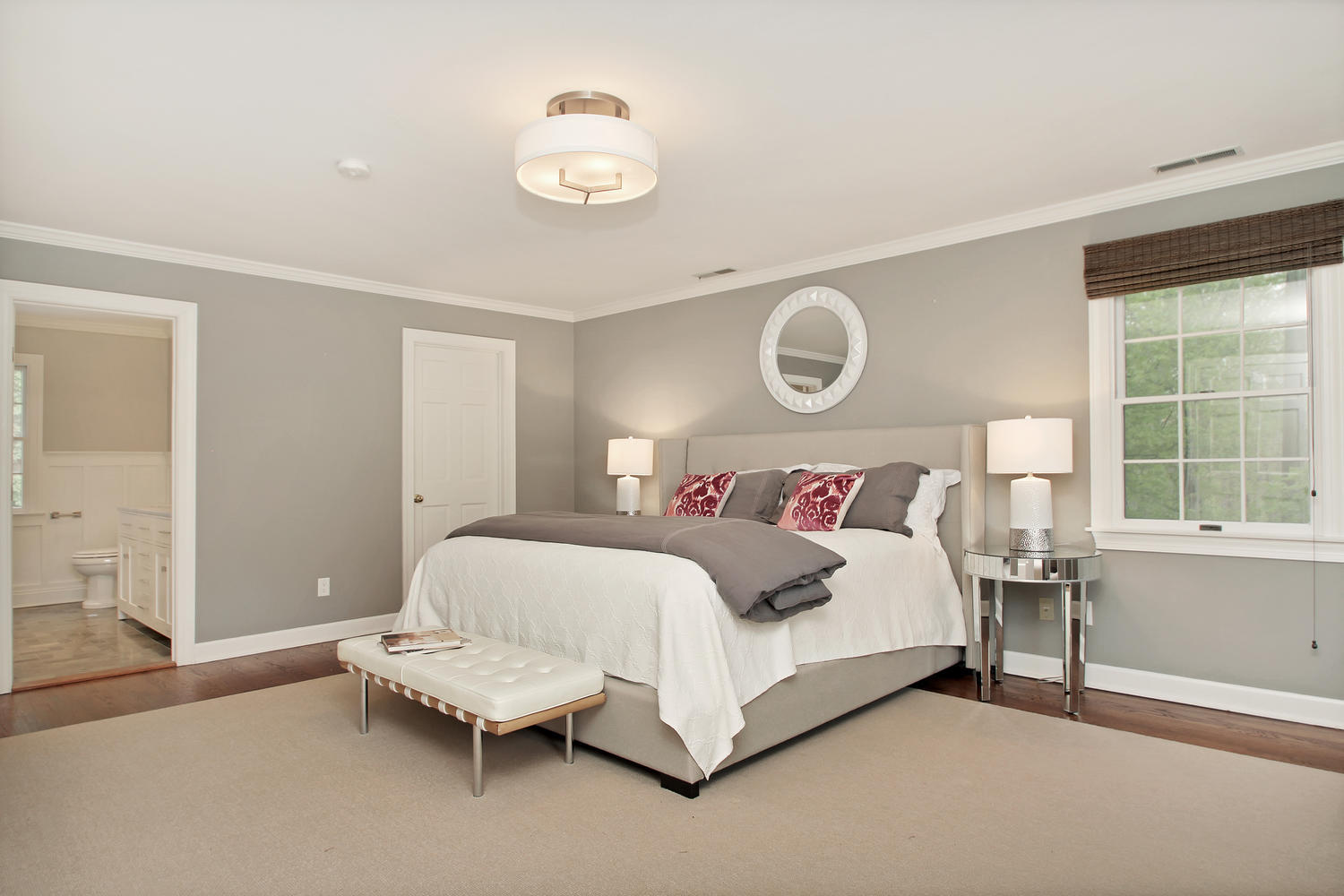 222 Marshall Ridge Road New Canaan, CT 06840 - Photo 28 of 49 a spacious bedroom with a bed and a window