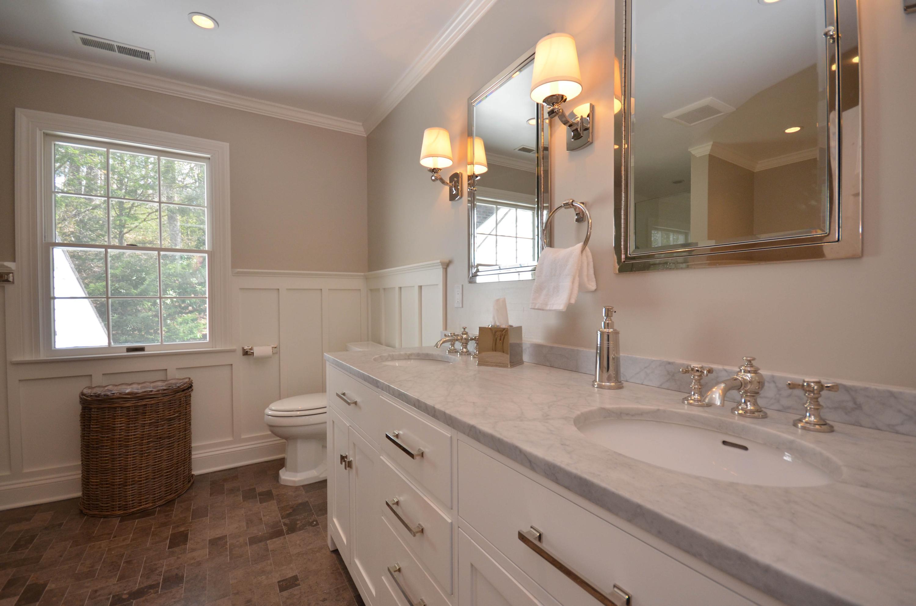 222 Marshall Ridge Road New Canaan, CT 06840 - Photo 30 of 49 a bathroom with a granite countertop sink mirror and toilet