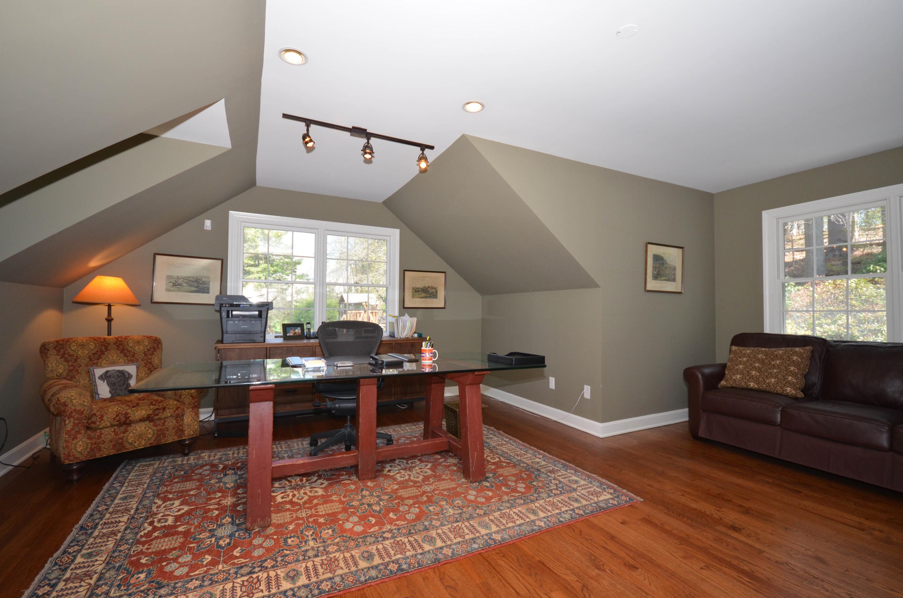 222 Marshall Ridge Road New Canaan, CT 06840 - Photo 36 of 49 a living room with furniture and a window